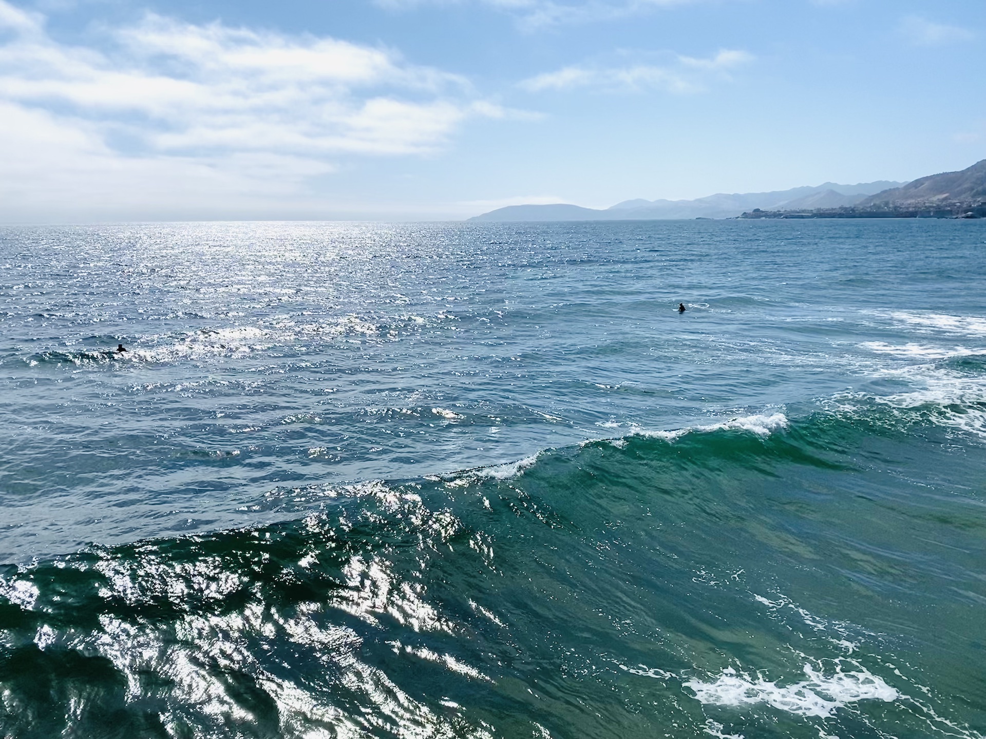 Surfing at Pismo Pier